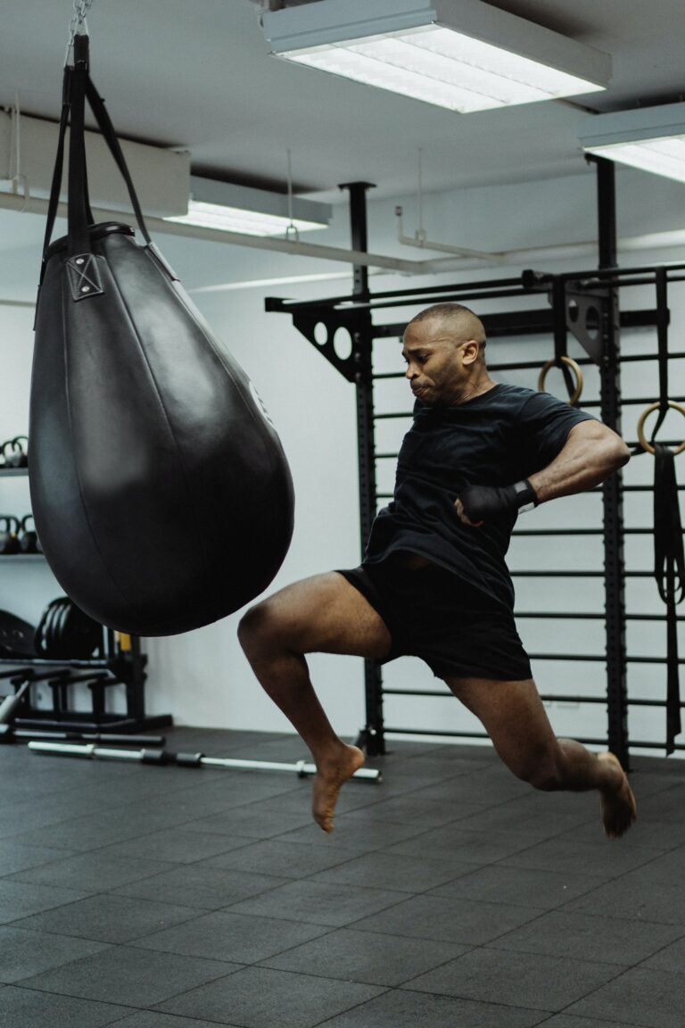 Man using a boxing punch bag